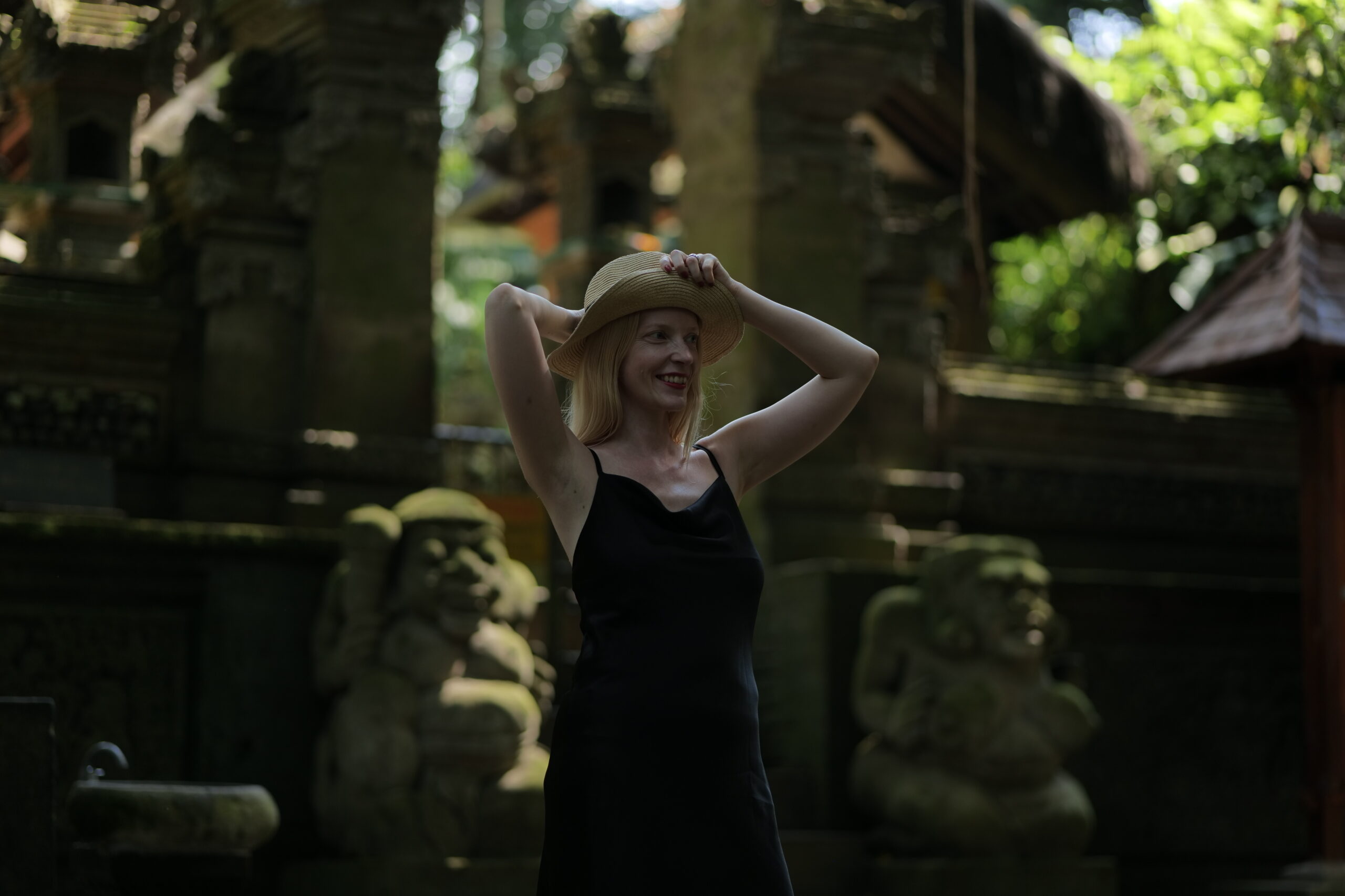 blonde woman in the jungle in the sun